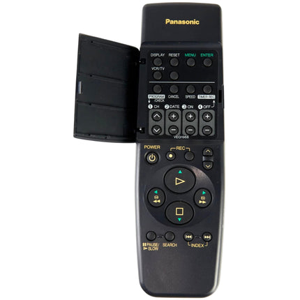 Black Panasonic remote control with open battery cover on a white background